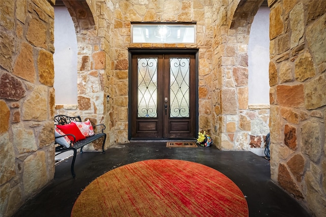 property entrance featuring french doors