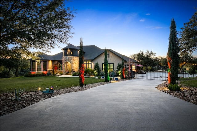 view of front of home with a yard