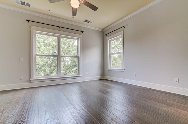 unfurnished room with ornamental molding, ceiling fan, and dark hardwood / wood-style flooring