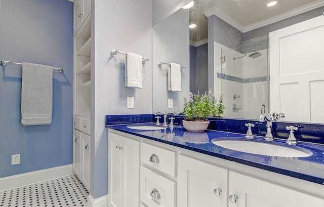 bathroom featuring crown molding, vanity, and walk in shower