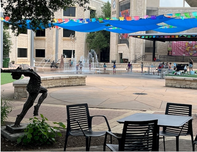 view of community with a patio area