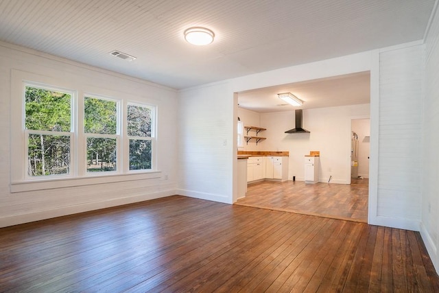 unfurnished living room with dark wood-type flooring