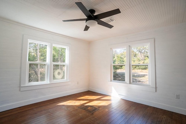 unfurnished room with hardwood / wood-style flooring and ceiling fan