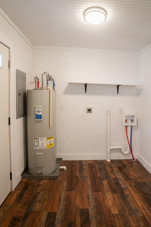 utility room featuring electric water heater and electric panel