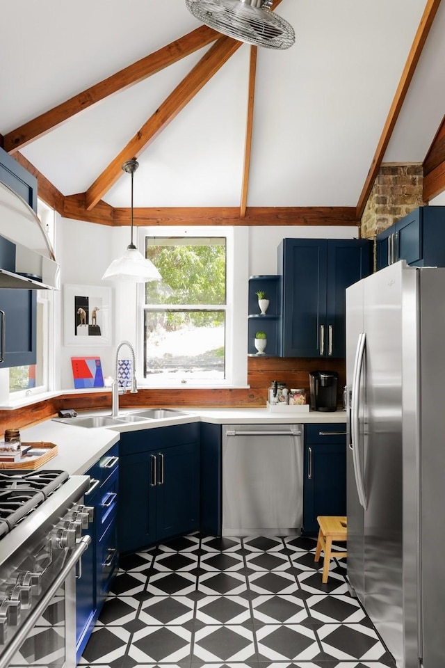 kitchen featuring blue cabinetry, hanging light fixtures, and appliances with stainless steel finishes