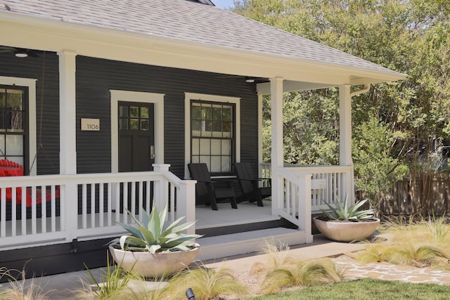 entrance to property featuring a porch