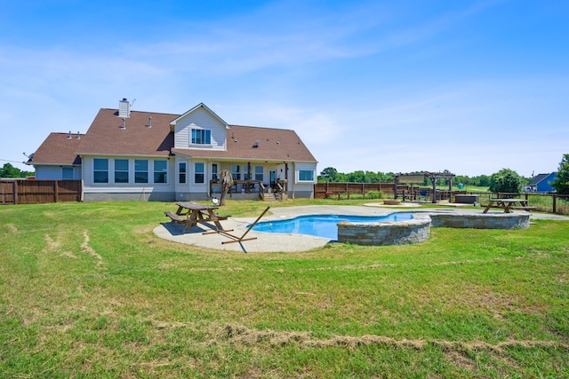 view of swimming pool with a fenced in pool, a fenced backyard, a yard, and a pergola