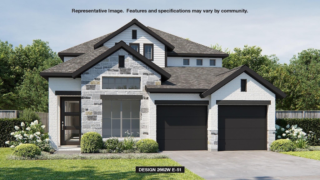 view of front of home with a garage