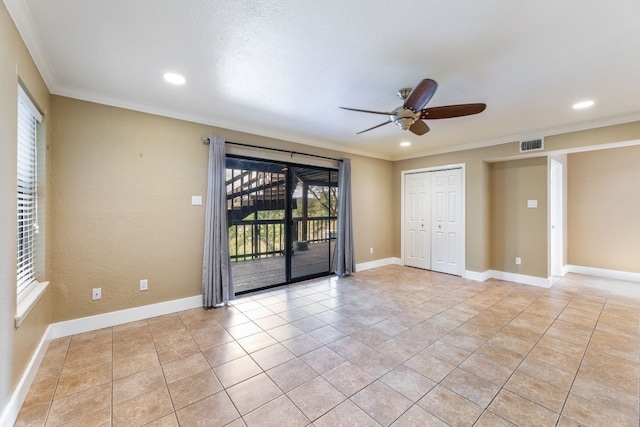 spare room with light tile patterned flooring, ceiling fan, and ornamental molding