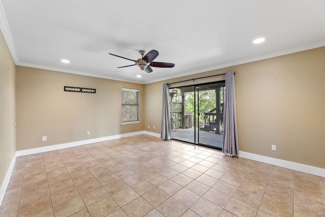 spare room featuring ornamental molding, ceiling fan, and light tile patterned flooring