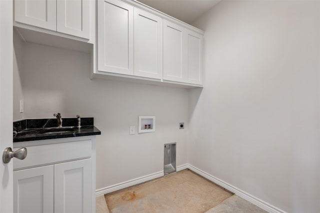 clothes washing area with cabinets, sink, washer hookup, and hookup for an electric dryer