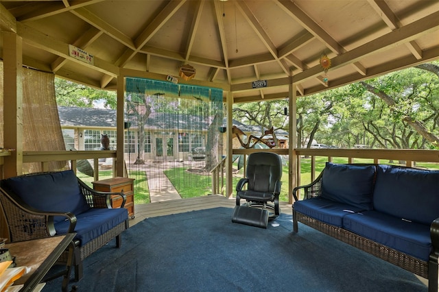 sunroom / solarium with vaulted ceiling