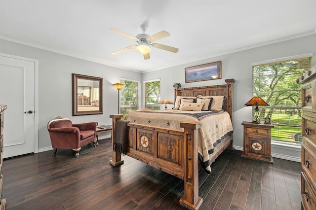 bedroom with ceiling fan, dark hardwood / wood-style flooring, and ornamental molding