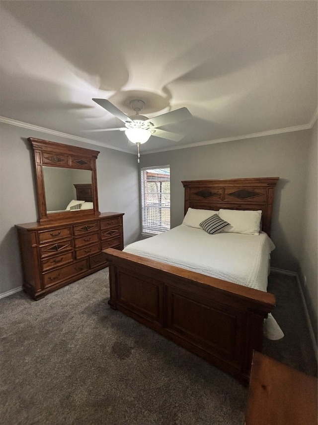 bedroom featuring ceiling fan, dark carpet, and crown molding