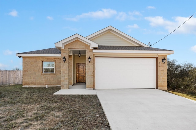 ranch-style home featuring a garage