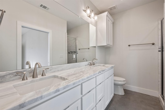 bathroom with vanity, toilet, and walk in shower