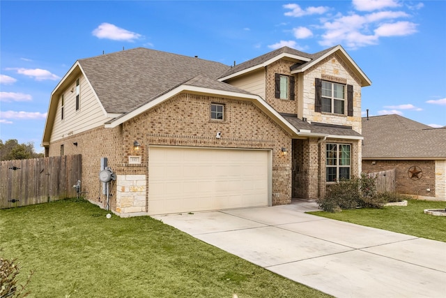 view of front of house featuring a garage and a front lawn