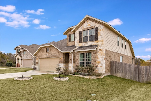 view of front facade with a garage and a front yard