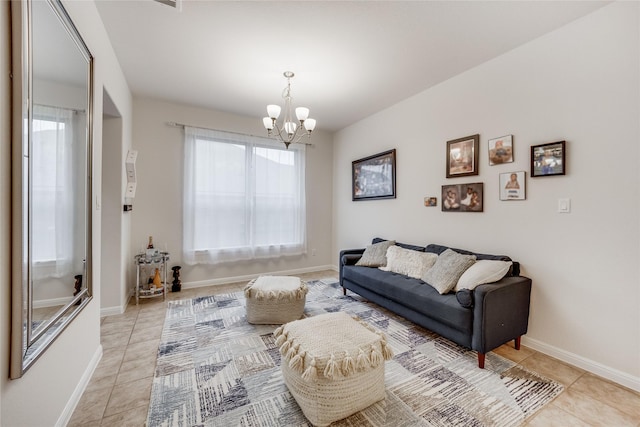 tiled living room with a notable chandelier and a wealth of natural light