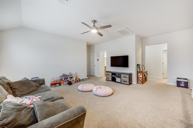 living room with carpet floors, ceiling fan, heating unit, and lofted ceiling