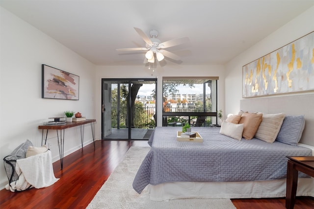 bedroom with access to outside, ceiling fan, and dark hardwood / wood-style flooring