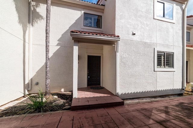 2918 Ranch Road 620th Rd N Unit B-109, Austin, TX 78734 - property entrance with stucco siding and a tile roof
