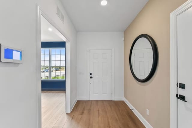 foyer entrance featuring light hardwood / wood-style floors