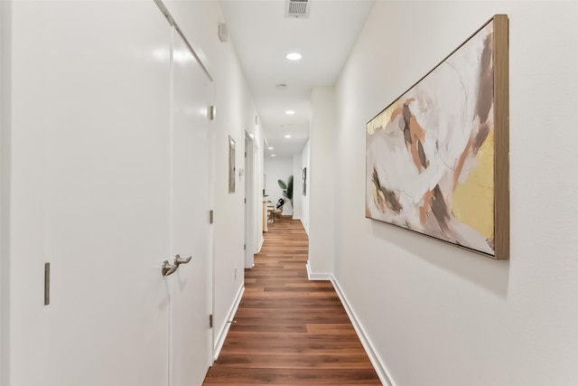 hall featuring dark hardwood / wood-style floors