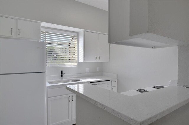 9507 Kempler Dr, Austin, TX 78748 - kitchen with white appliances, a sink, and white cabinets