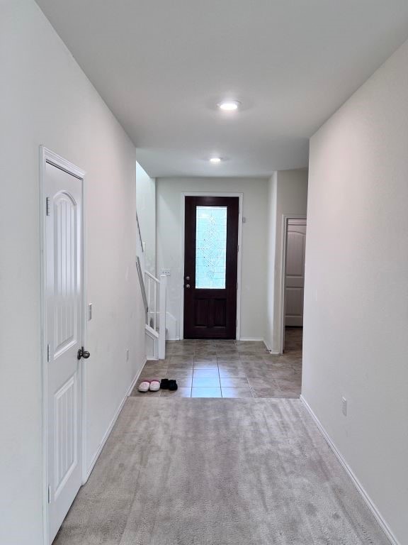 view of carpeted entryway