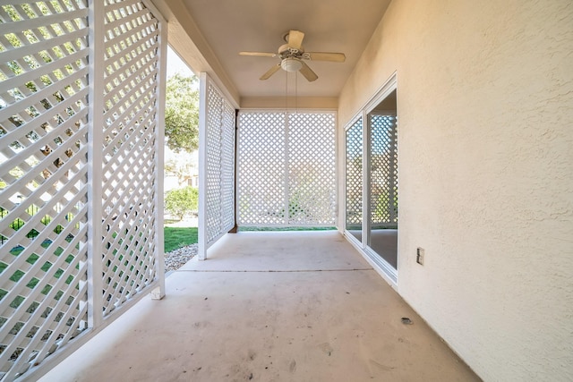 exterior space featuring ceiling fan