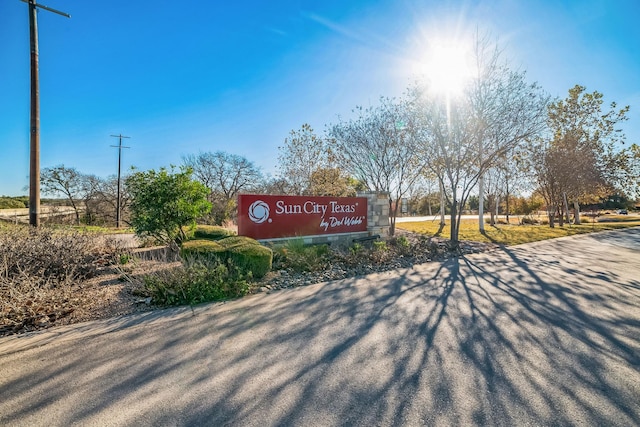 view of community sign