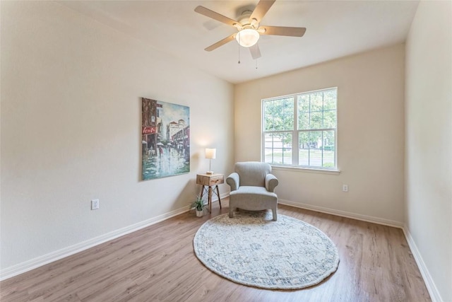 518 Texas Dr, Georgetown, TX 78633 - sitting room with light wood-style flooring, baseboards, and ceiling fan