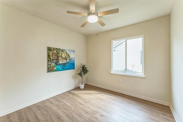 518 Texas Dr, Georgetown, TX 78633 - empty room featuring light wood-type flooring, baseboards, and a ceiling fan