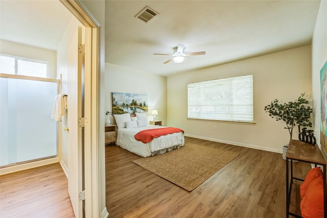 518 Texas Dr, Georgetown, TX 78633 - bedroom with wood finished floors and a ceiling fan