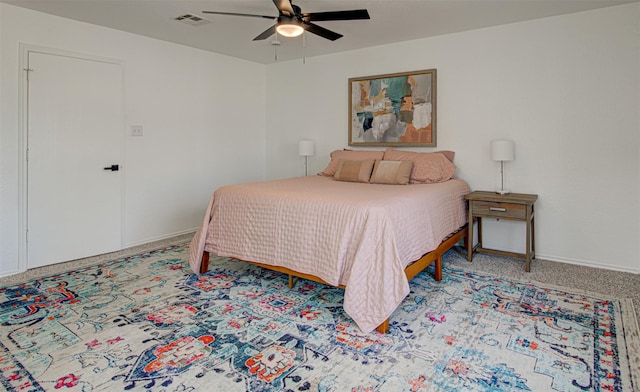 carpeted bedroom featuring ceiling fan