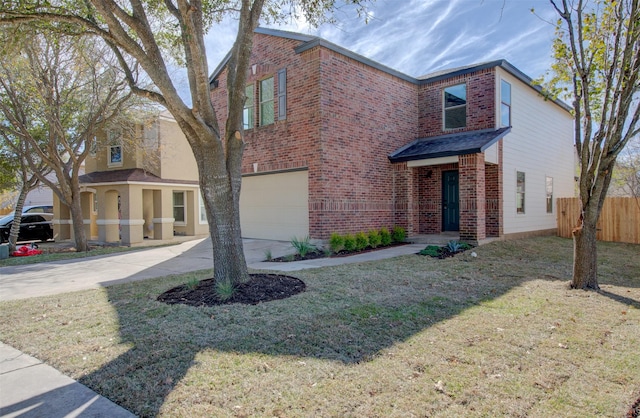 view of front of house with a garage and a front lawn