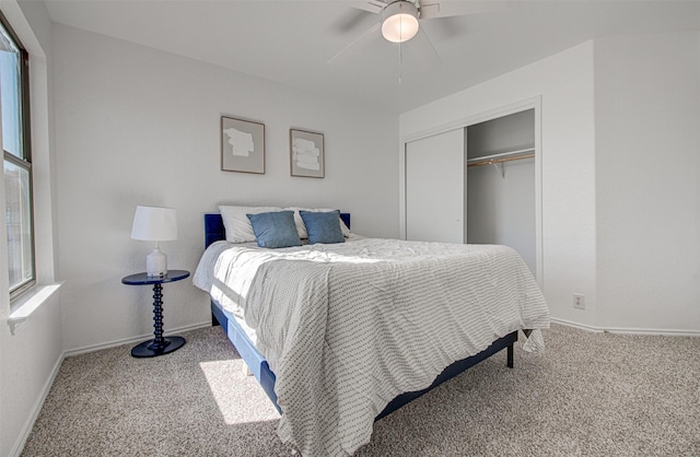 bedroom with carpet floors, a closet, and ceiling fan