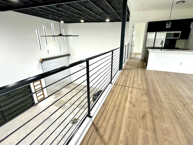 corridor featuring wood-type flooring