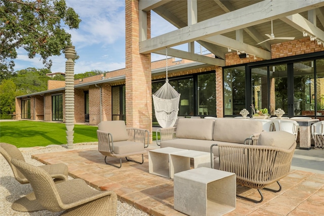 view of patio / terrace featuring outdoor lounge area and ceiling fan