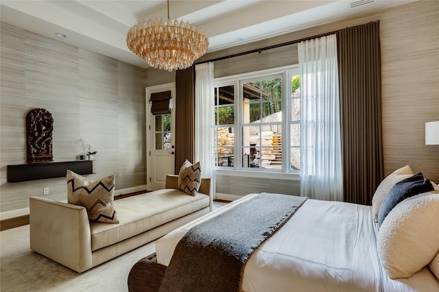 bedroom featuring a notable chandelier