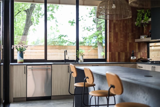 bar with stainless steel dishwasher and sink