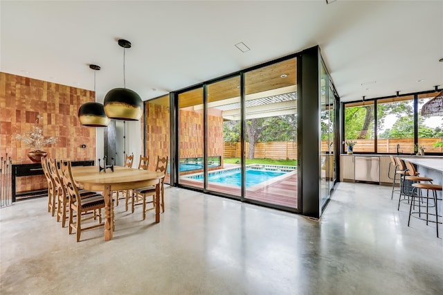 dining area featuring a healthy amount of sunlight