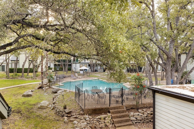 view of swimming pool featuring a patio