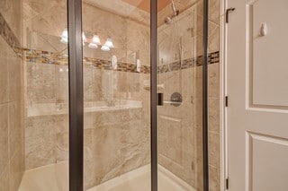 bathroom featuring walk in shower