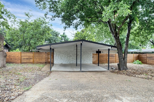 exterior space with a carport