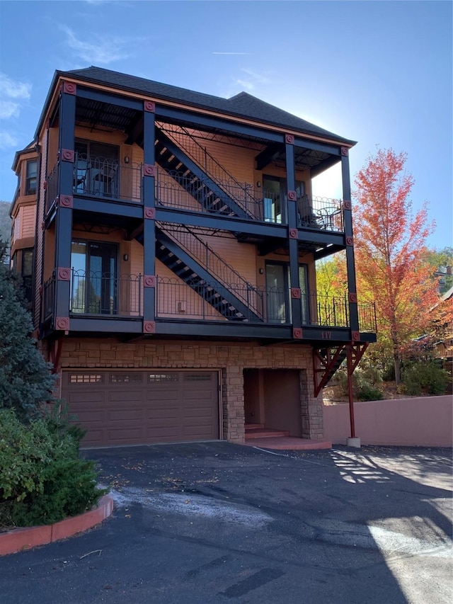 view of side of home with a garage