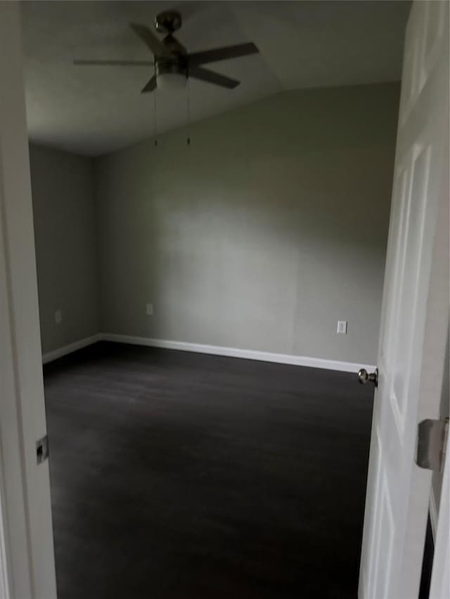 spare room with ceiling fan and lofted ceiling