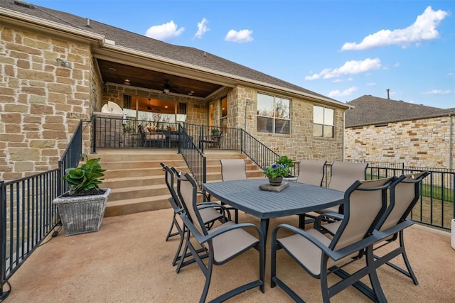 view of patio / terrace with ceiling fan and outdoor dining area