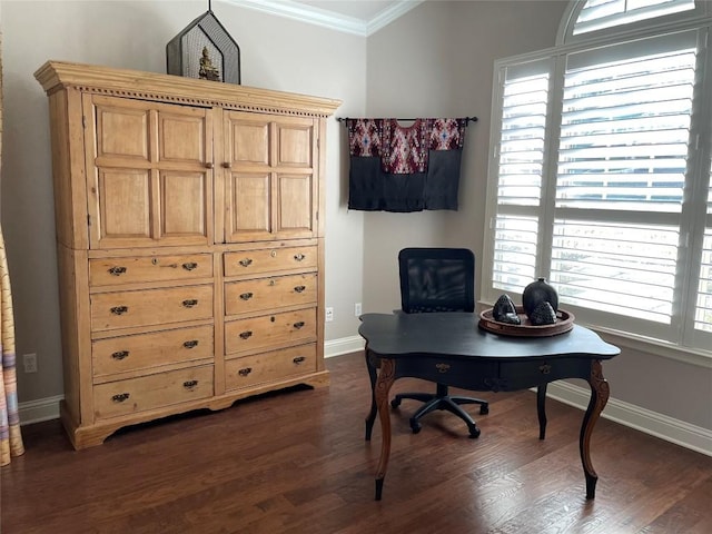 home office with dark wood-type flooring, crown molding, and baseboards